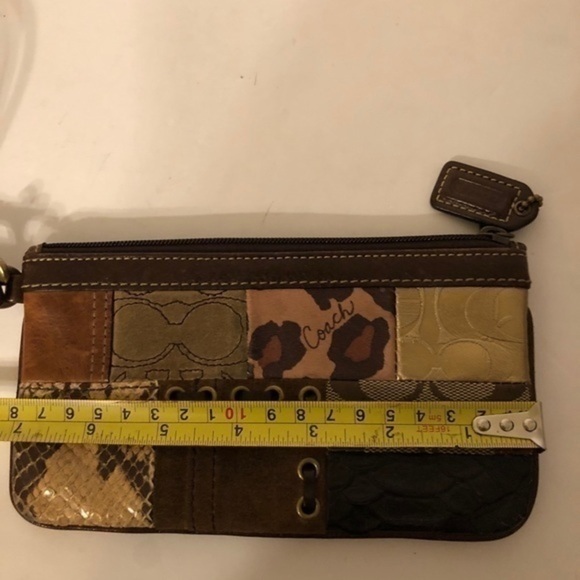COACH patchwork wristlet metallic brown embossed